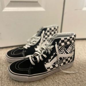 Van’s “off the wall” black and white checkered high tops. Size 10.5 US women.